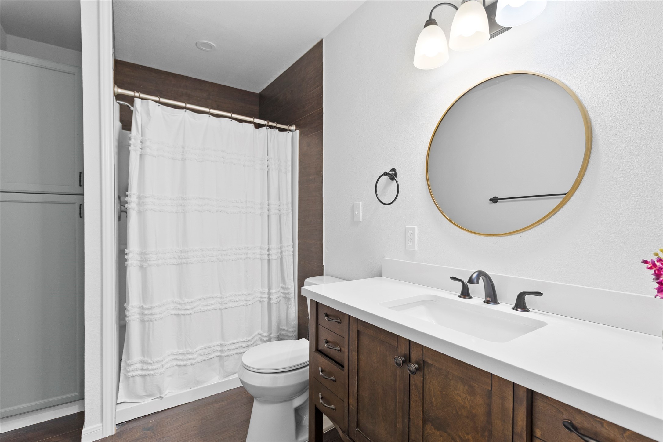 553 County Road 370 Splendora, TX 77372 - Photo 32 of 41 a bathroom with a sink and a mirror