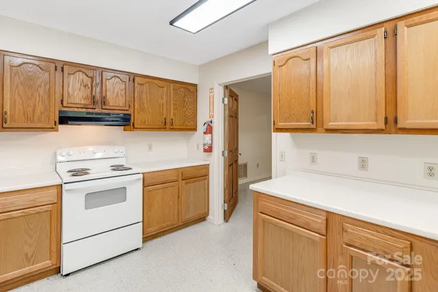 a bathroom with a toilet a sink a mirror a bathtub and shower