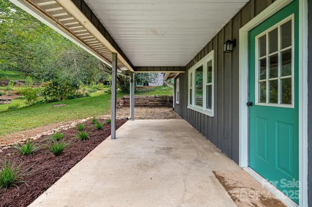 a view of a porch with garden
