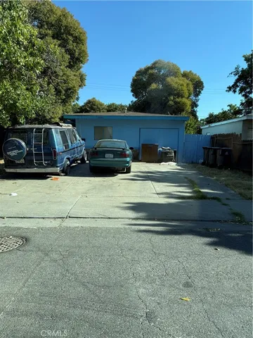a view of backyard with seating space