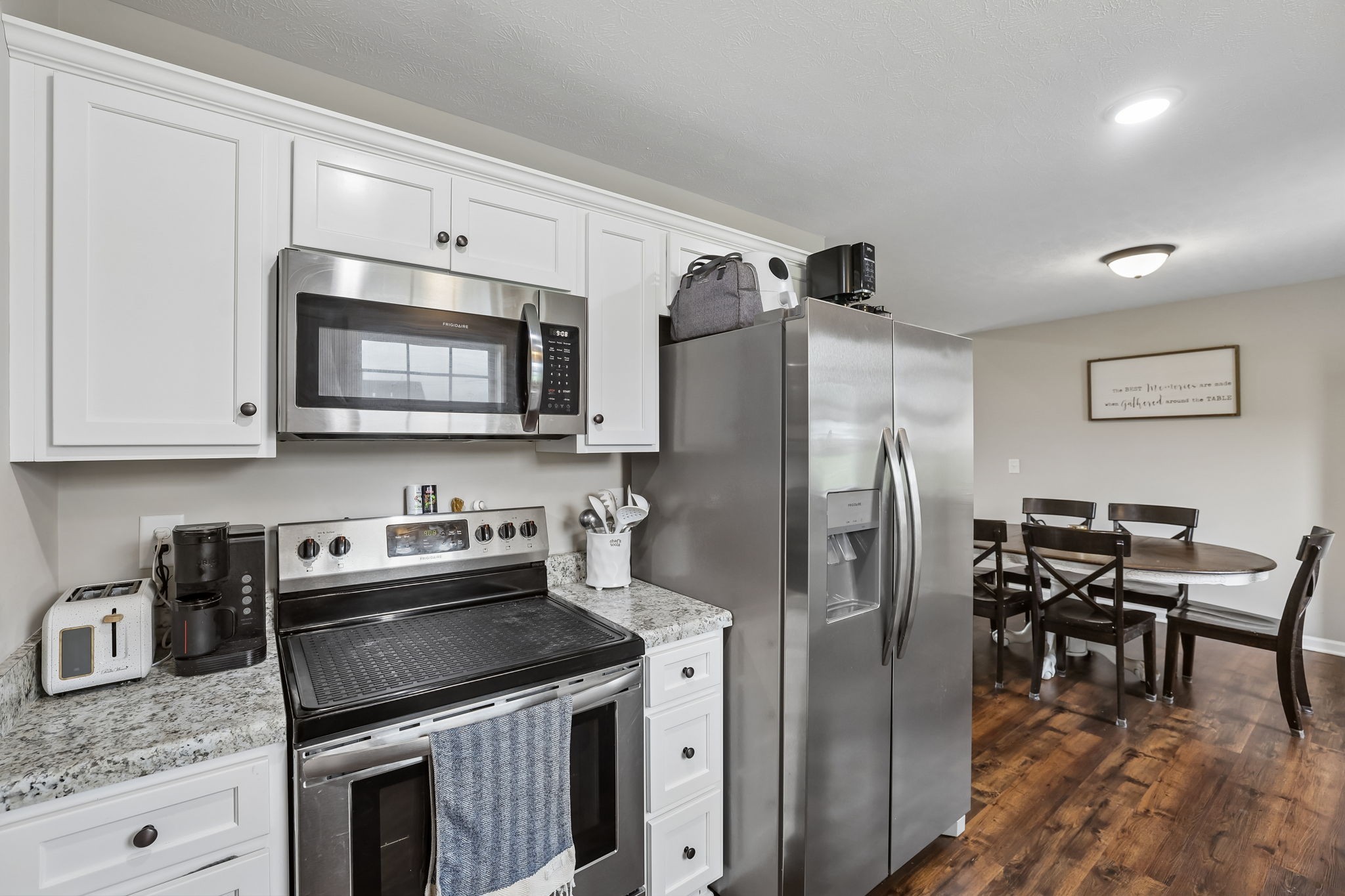 1715 Old Belfast Road Lewisburg, TN 37091 - Photo 21 of 42 a kitchen with stainless steel appliances granite countertop a refrigerator stove microwave and sink