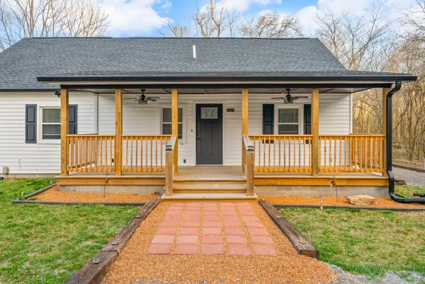 a front view of a house with a porch