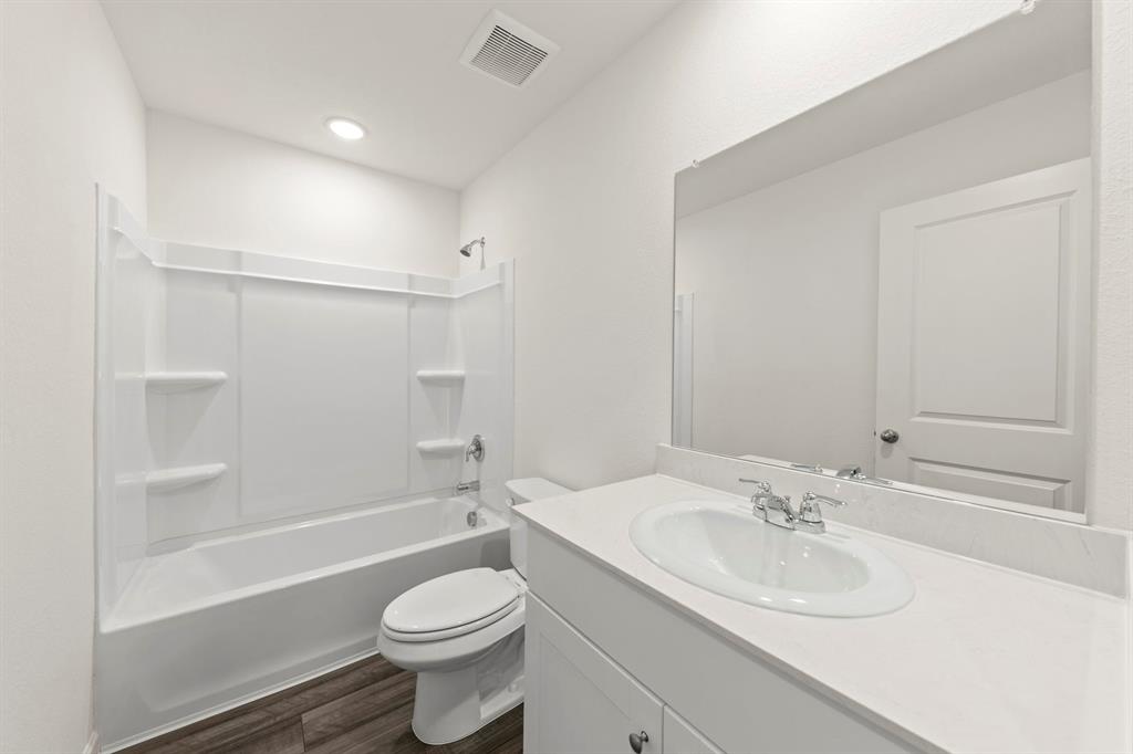 1508 Lake Alpine Trail Anna, TX 75409 - Photo 24 of 40 a bathroom with a sink toilet and shower