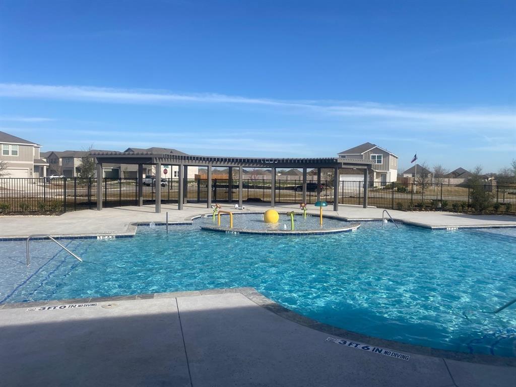 1508 Lake Alpine Trail Anna, TX 75409 - Photo 39 of 40 a view of a swimming pool with an outdoor seating and a yard