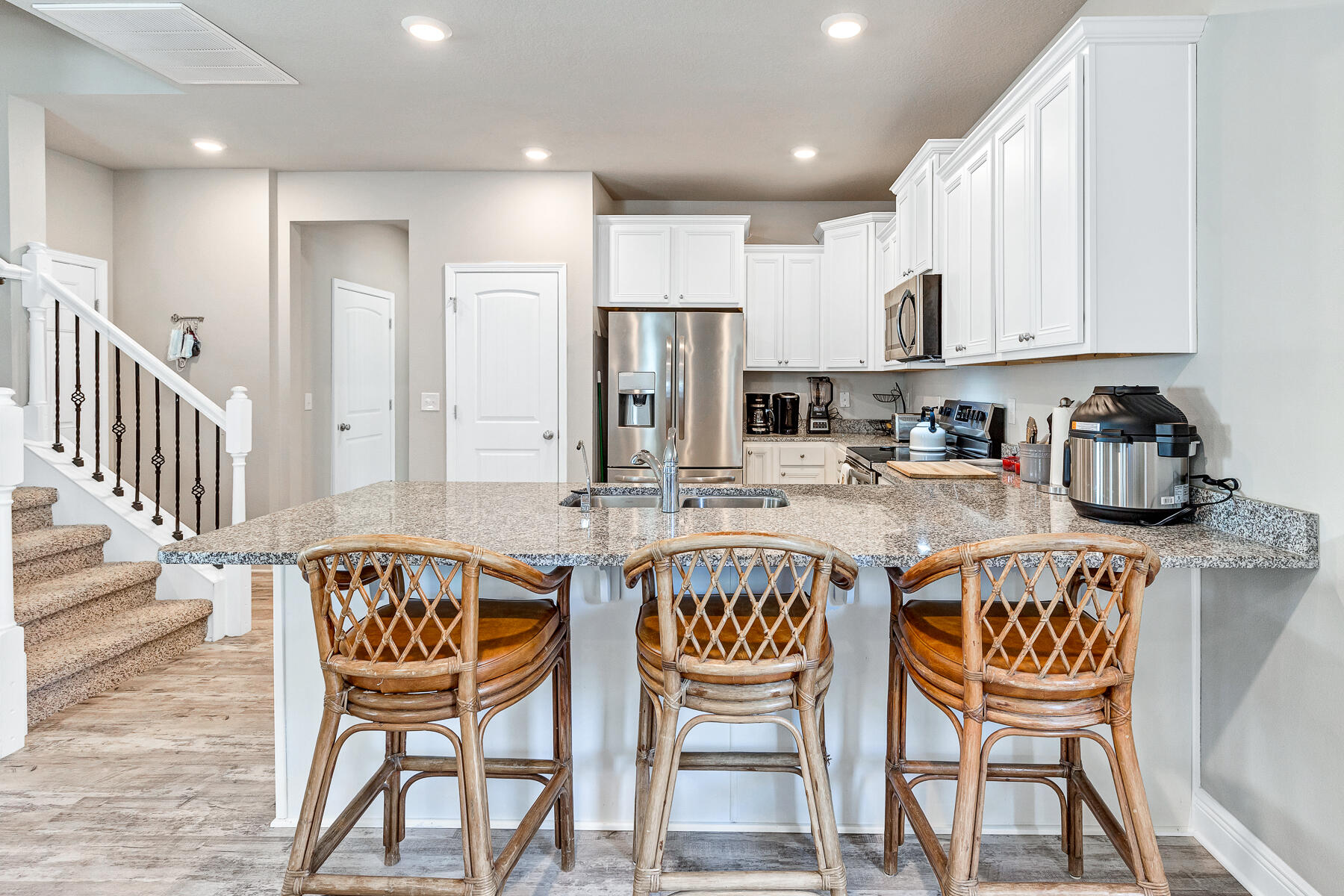 186 Southern Pnes Road Santa Rosa Beach, FL 32459 - Photo 11 of 32 a table and chairs in a kitchen