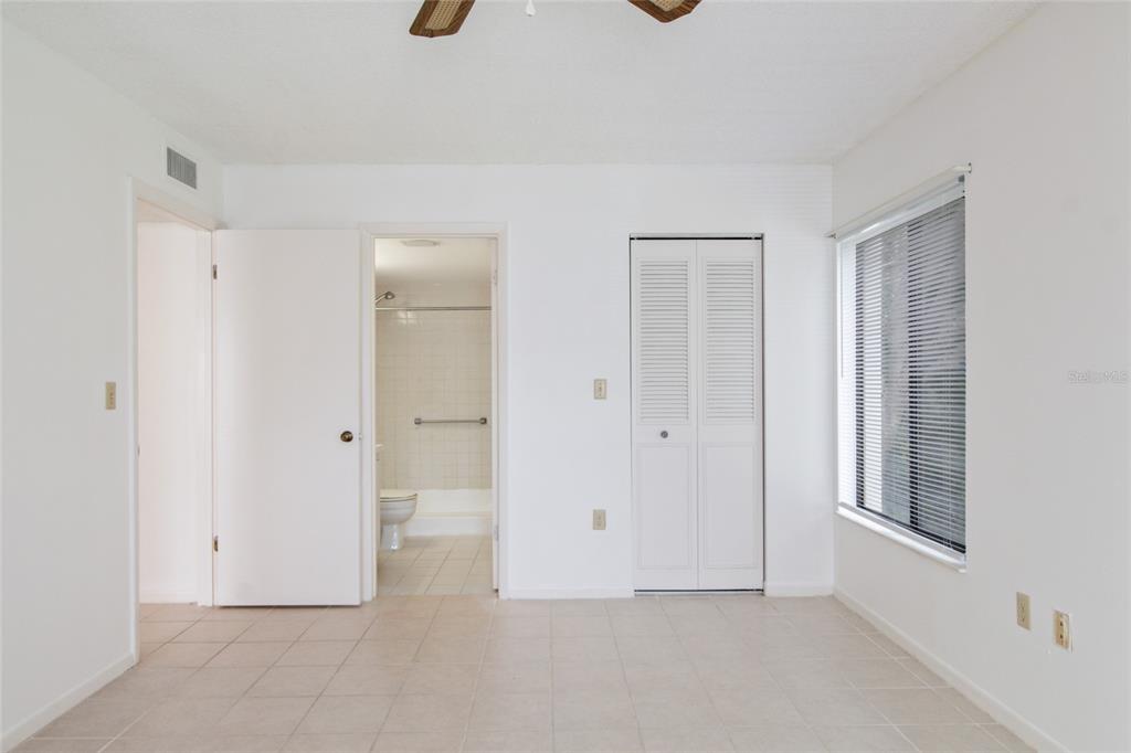 1308 Pine Ridge Circle East, Unit H2 Tarpon Springs, FL 34688 - Photo 7 of 17 a view of an empty room