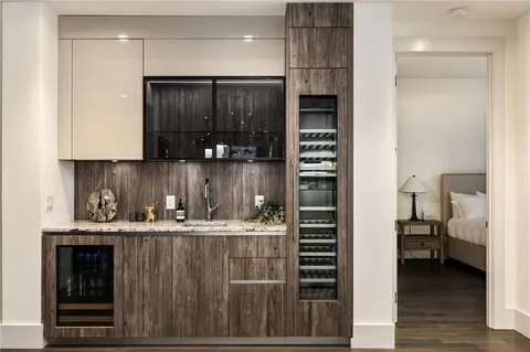 a kitchen with a sink and cabinets