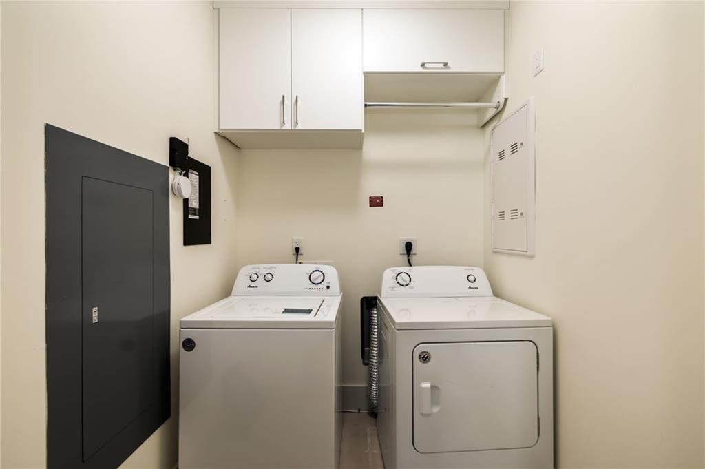 3107 Peachtree Road Northeast, Unit 1803 Atlanta, GA 30305 - Photo 32 of 45 a utility room with dryer and washer