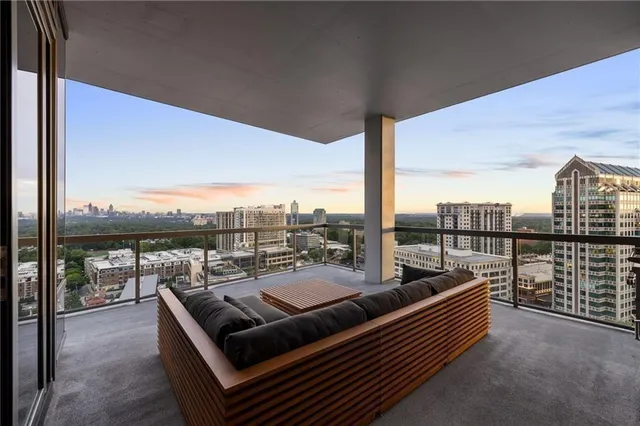 a view of a roof deck with couches