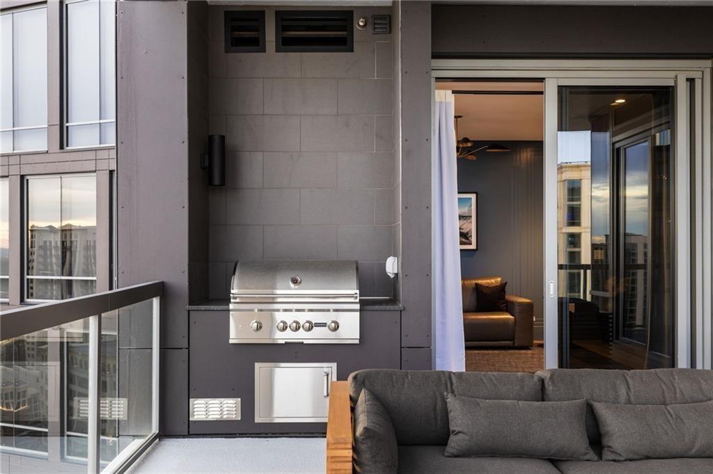 3107 Peachtree Road Northeast, Unit 1803 Atlanta, GA 30305 - Photo 37 of 45 a view of a livingroom with furniture