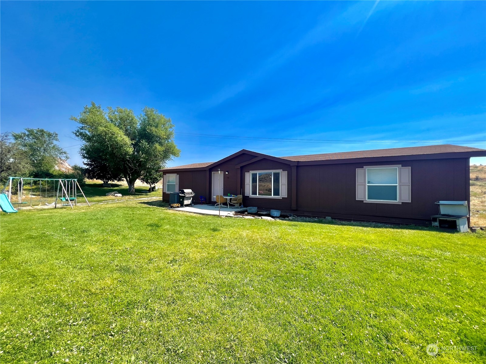 256 C Riverside Cutoff Road Riverside, WA 98849 - Photo 5 of 36 a house view with a seating space