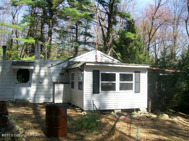 3147 Kroucher Road Stroudsburg, PA 18360 - Photo 1 of 1 a front view of a house with yard
