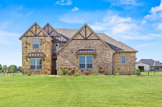a kitchen with cabinets and appliances