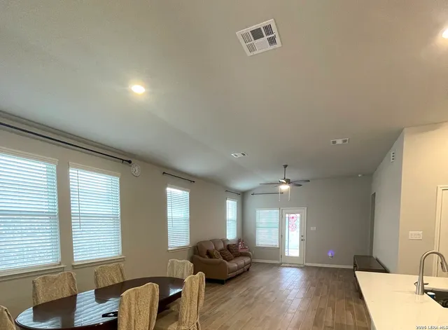 a lobby with furniture and window