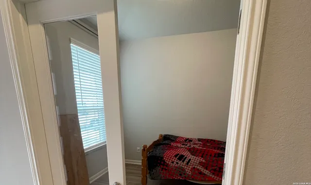 a view of bedroom and window