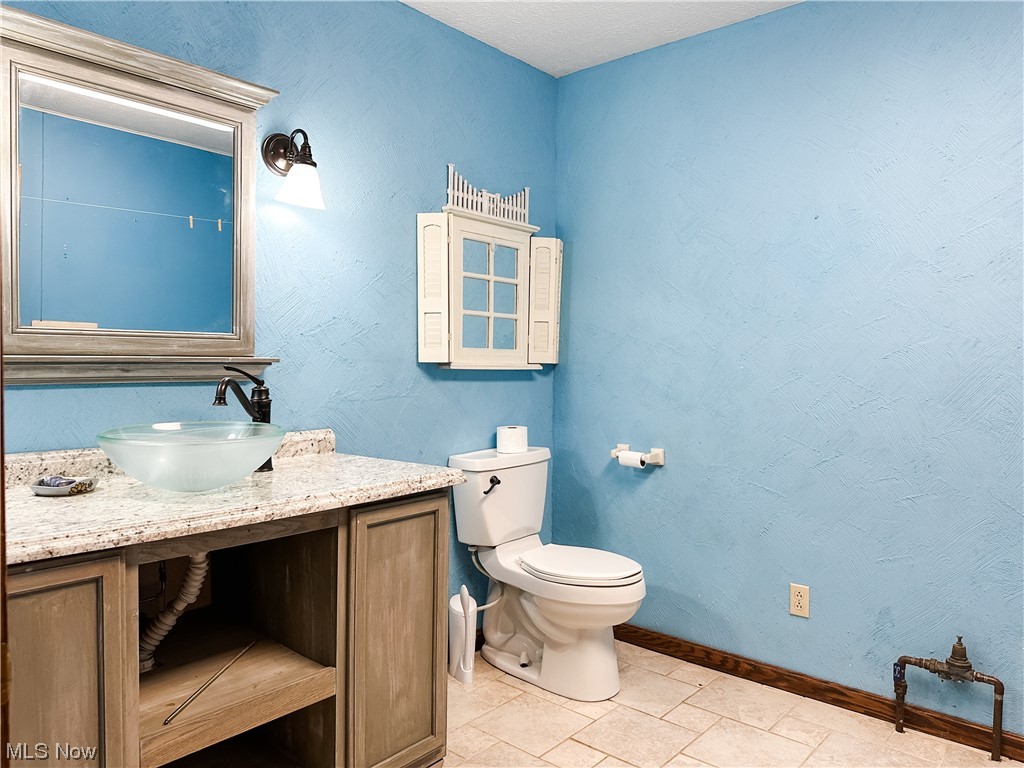 1790 Meldahl Road Washington, WV 26181 - Photo 18 of 35 Half bath and laundry area on first floor ...