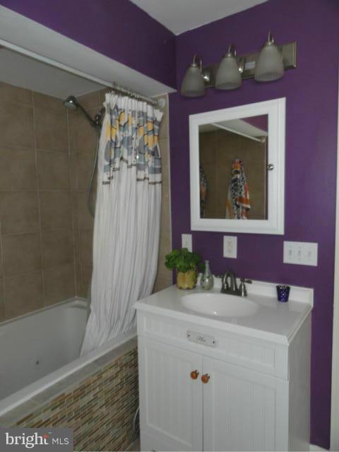 403 Paradise Road Riva, MD 21140 - Photo 18 of 22 a bathroom with a sink vanity and a mirror