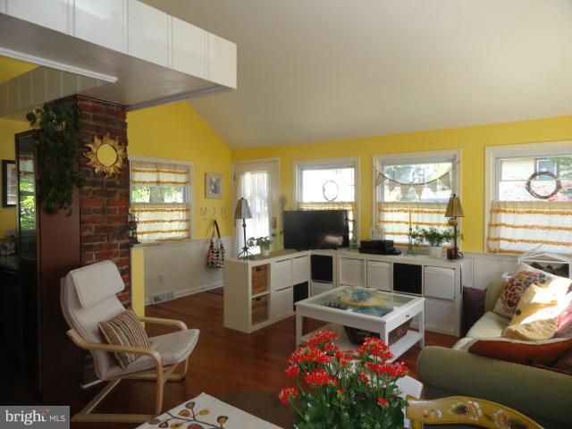 403 Paradise Road Riva, MD 21140 - Photo 7 of 22 a living room with furniture a window and a table