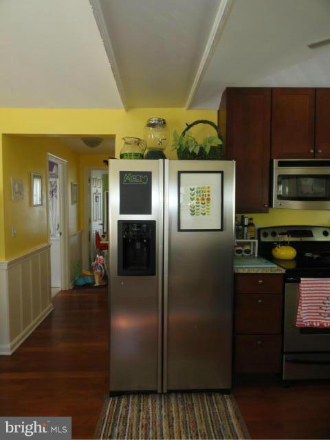 403 Paradise Road Riva, MD 21140 - Photo 10 of 22 a kitchen with stainless steel appliances granite countertop a refrigerator and a sink