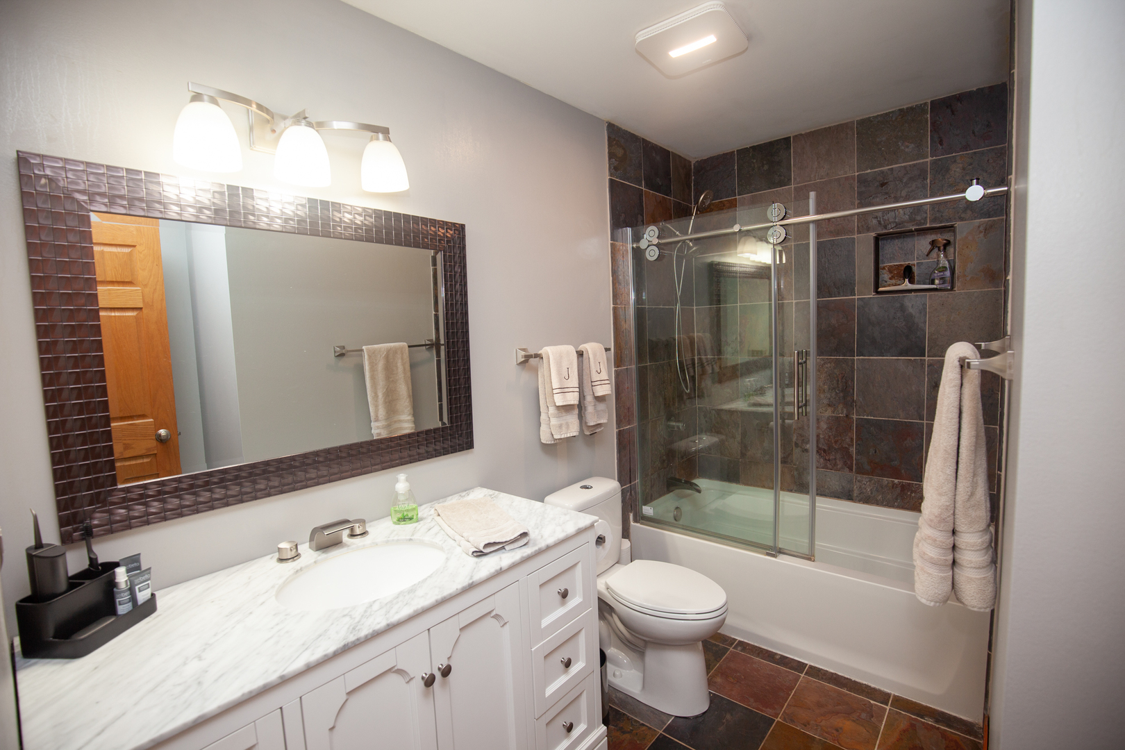 613 Cartwright Trail McHenry, IL 60050 - Photo 11 of 23 a bathroom with a sink vanity granite toilet and shower