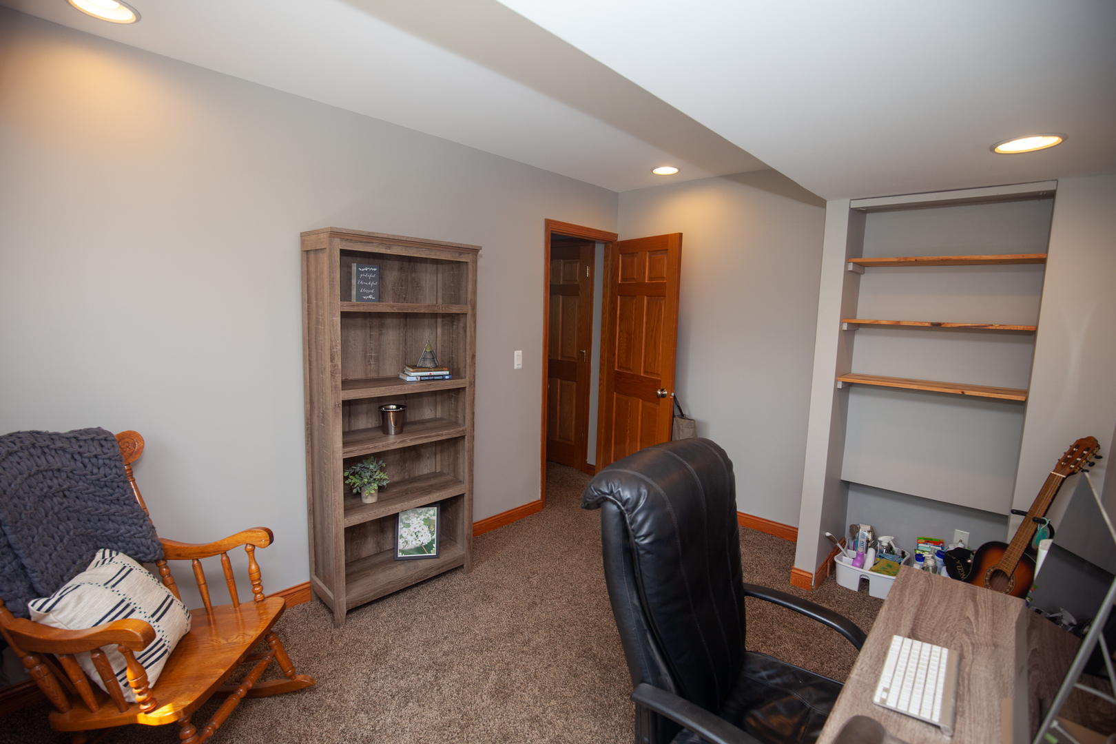 613 Cartwright Trail McHenry, IL 60050 - Photo 12 of 23 a living room with furniture and a chair