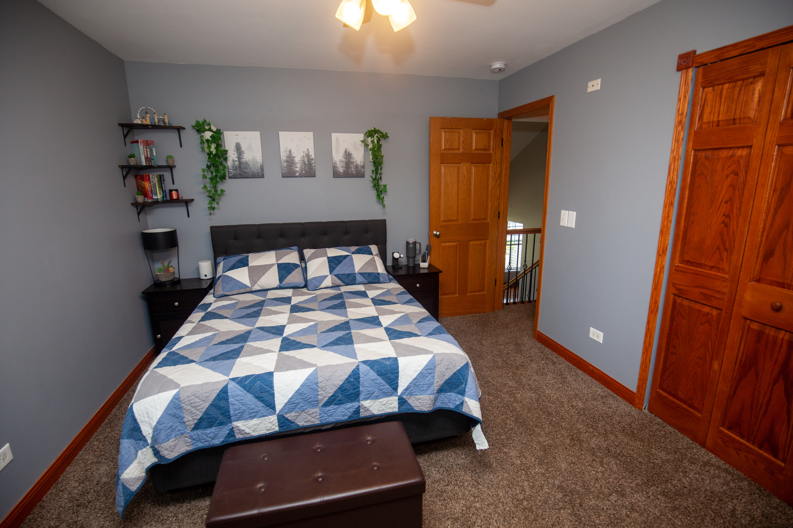 613 Cartwright Trail McHenry, IL 60050 - Photo 14 of 23 a bed sitting in a bedroom next to a window