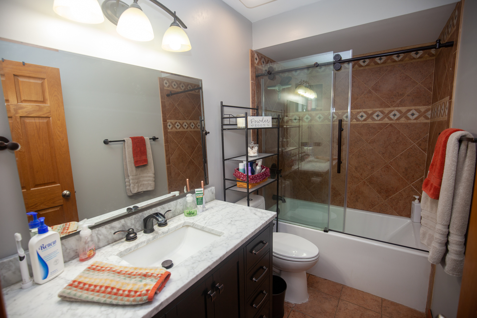 613 Cartwright Trail McHenry, IL 60050 - Photo 18 of 23 a bathroom with a sink toilet and shower