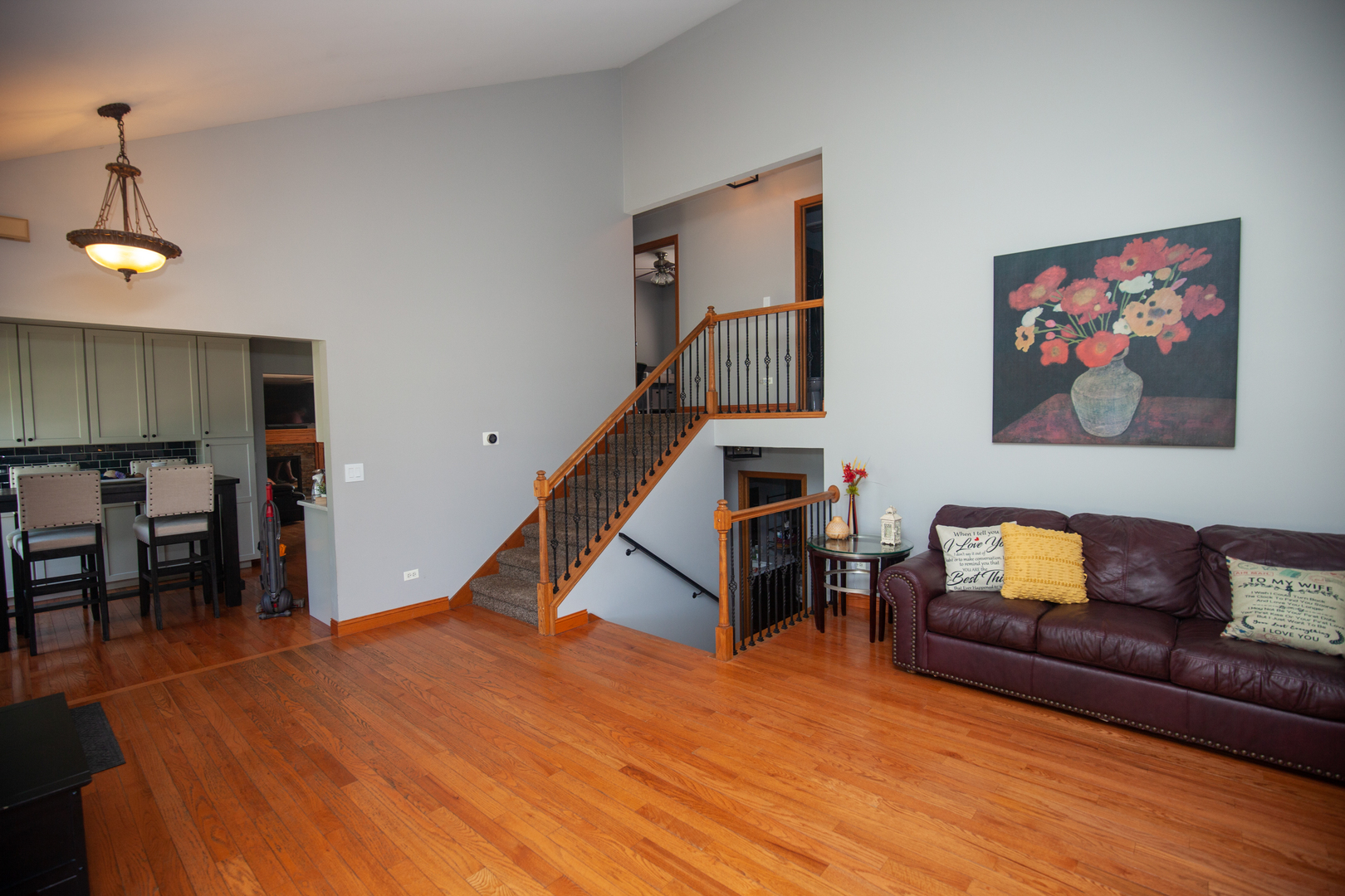 613 Cartwright Trail McHenry, IL 60050 - Photo 5 of 23 a living room with furniture and stairs