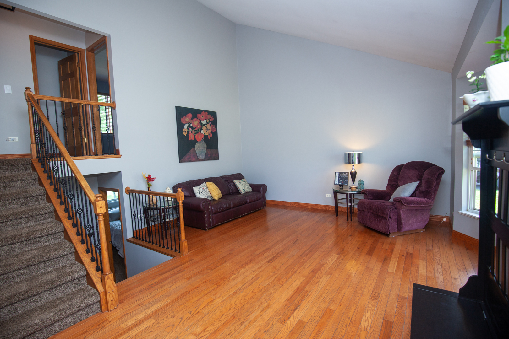 613 Cartwright Trail McHenry, IL 60050 - Photo 6 of 23 a living room with furniture and a wooden floor