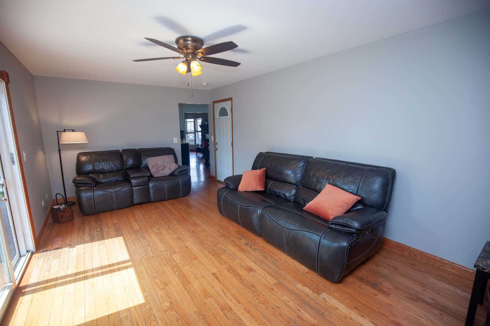 613 Cartwright Trail McHenry, IL 60050 - Photo 7 of 23 a living room with furniture and a ceiling fan