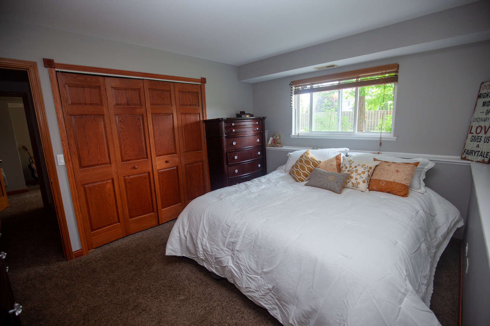 613 Cartwright Trail McHenry, IL 60050 - Photo 9 of 23 a bedroom with a bed and a window