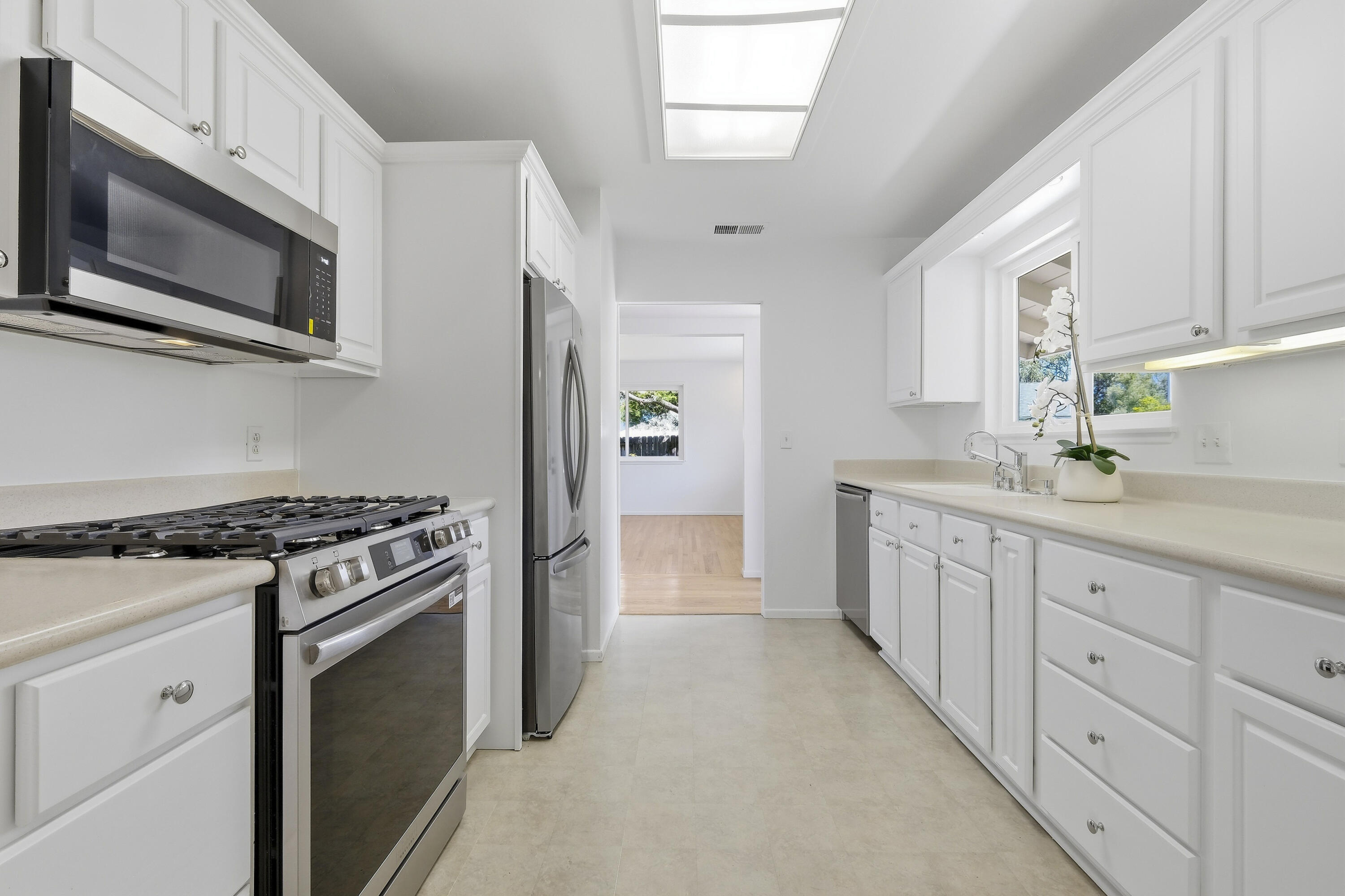 529 Via Rueda Santa Barbara, CA 93110 - Photo 16 of 34 a kitchen with granite countertop cabinets and steel stainless steel appliances