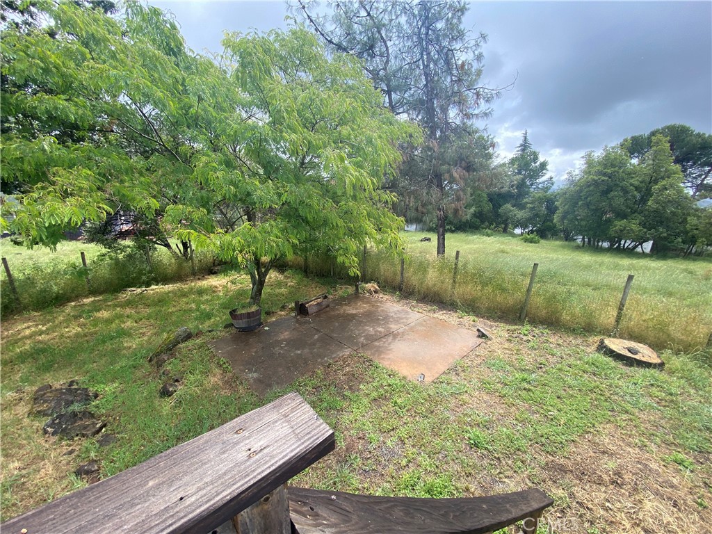 16506 Ridgecrest Court Hidden Valley Lake, CA 95467 - Photo 20 of 25 a view of a backyard with wooden fence