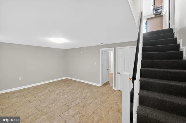 a view of an entryway with stairs