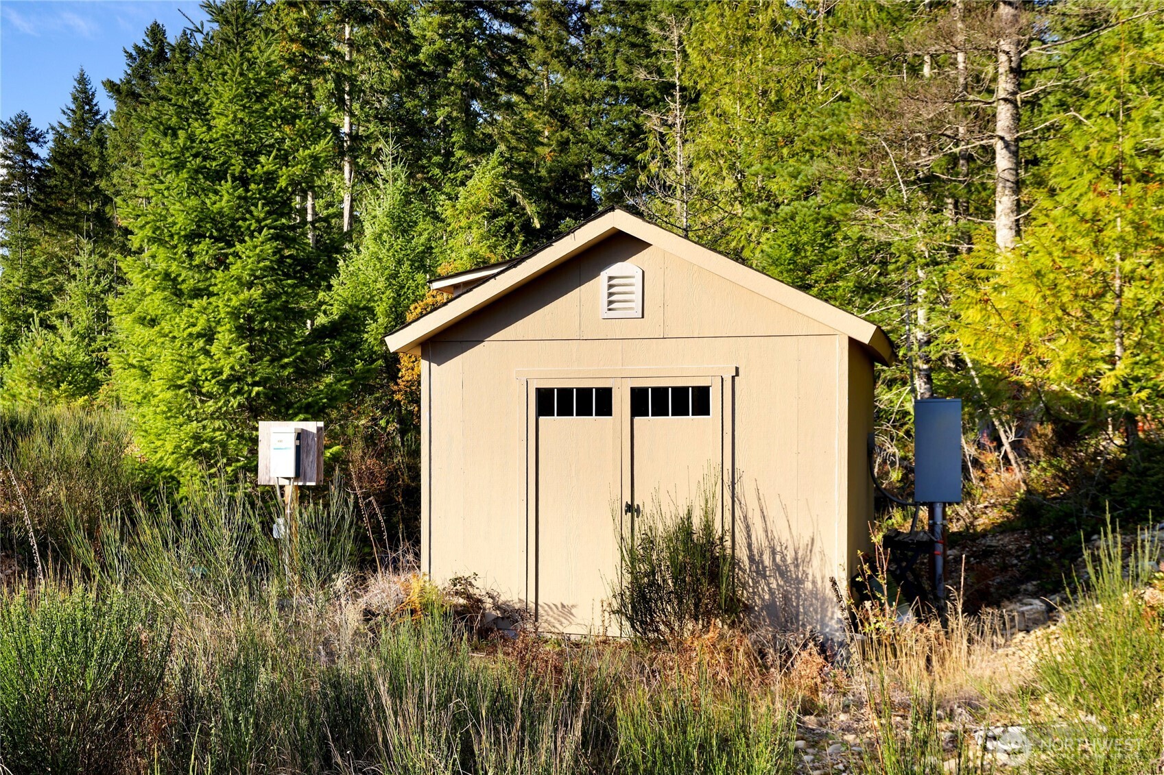 63 Wayne Road West Seabeck, WA 98380 - Photo 9 of 22 a house view with a outdoor space