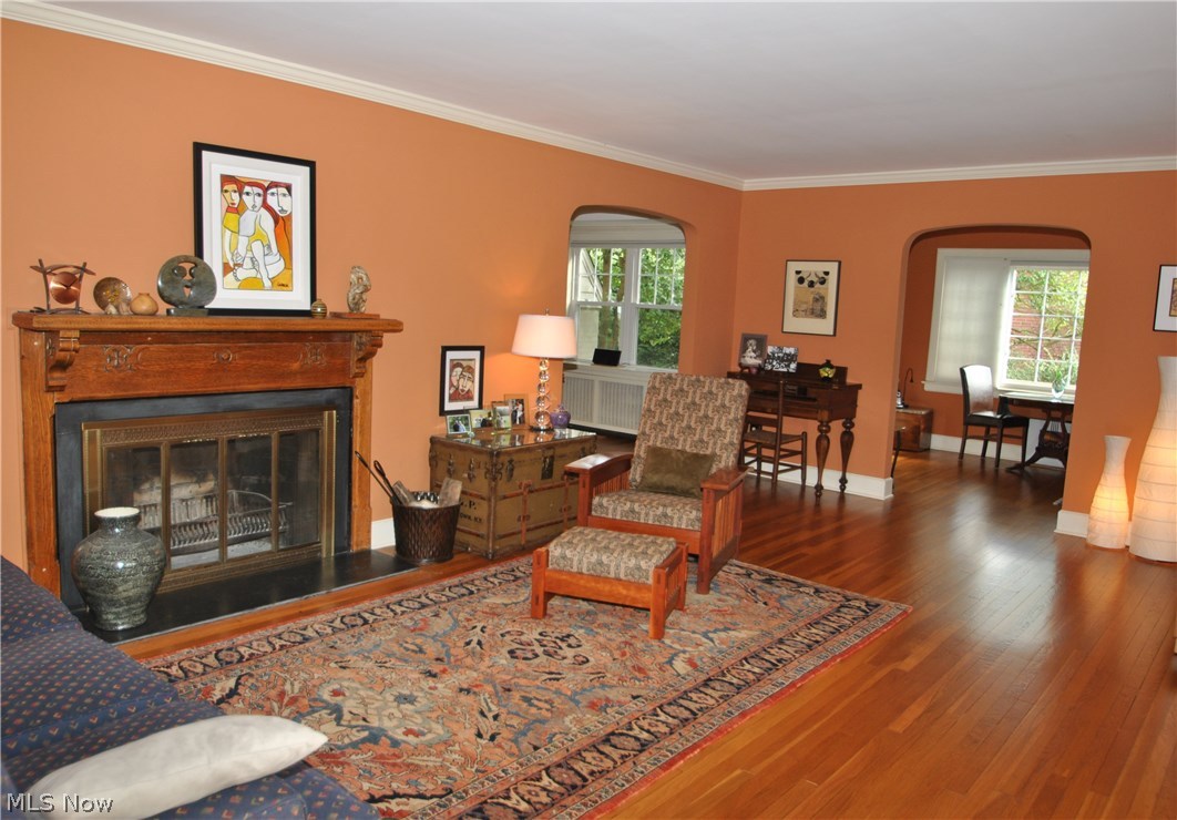 2881 Bellaire Road Silver Lake, OH 44224 - Photo 2 of 29 Gleaming hardwood floors grace the living room, dining room and library. Arched doorways and custom wood mantel enhance the living room