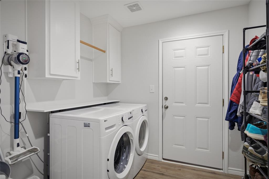 105 Thode Street Whitesboro, TX 76273 - Photo 22 of 28 a view of walk in closet with clothes washer and dryer