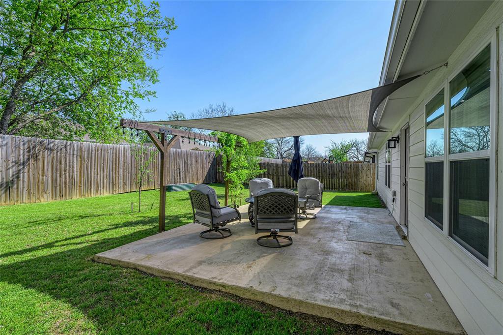 105 Thode Street Whitesboro, TX 76273 - Photo 4 of 28 a view of outdoor space yard and patio