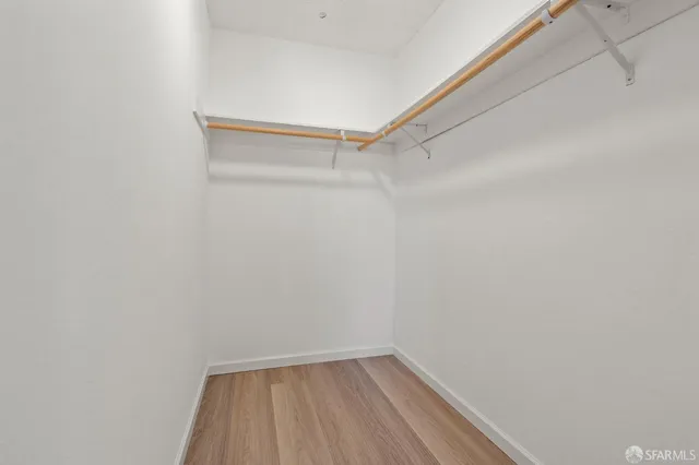a view of an empty walk in closet