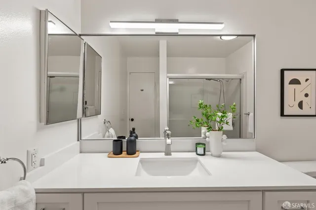 a bathroom with a sink and a mirror