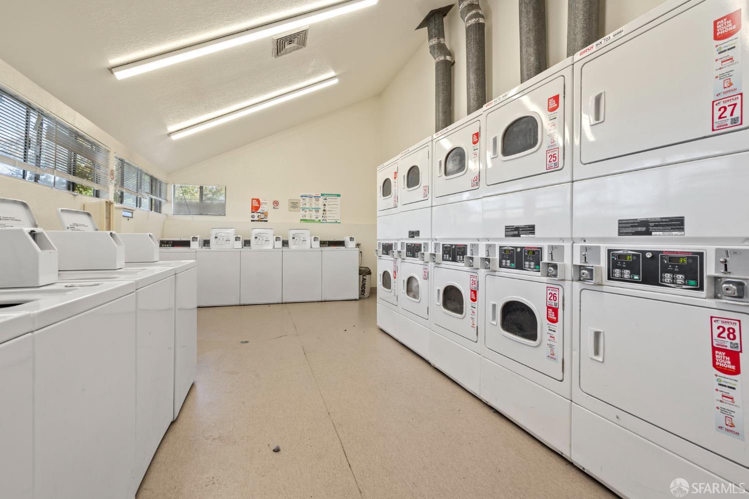 5319 Ridgeview Circle, Unit 10 El Sobrante, CA 94803 - Photo 25 of 26 a utility room with dryer and washer
