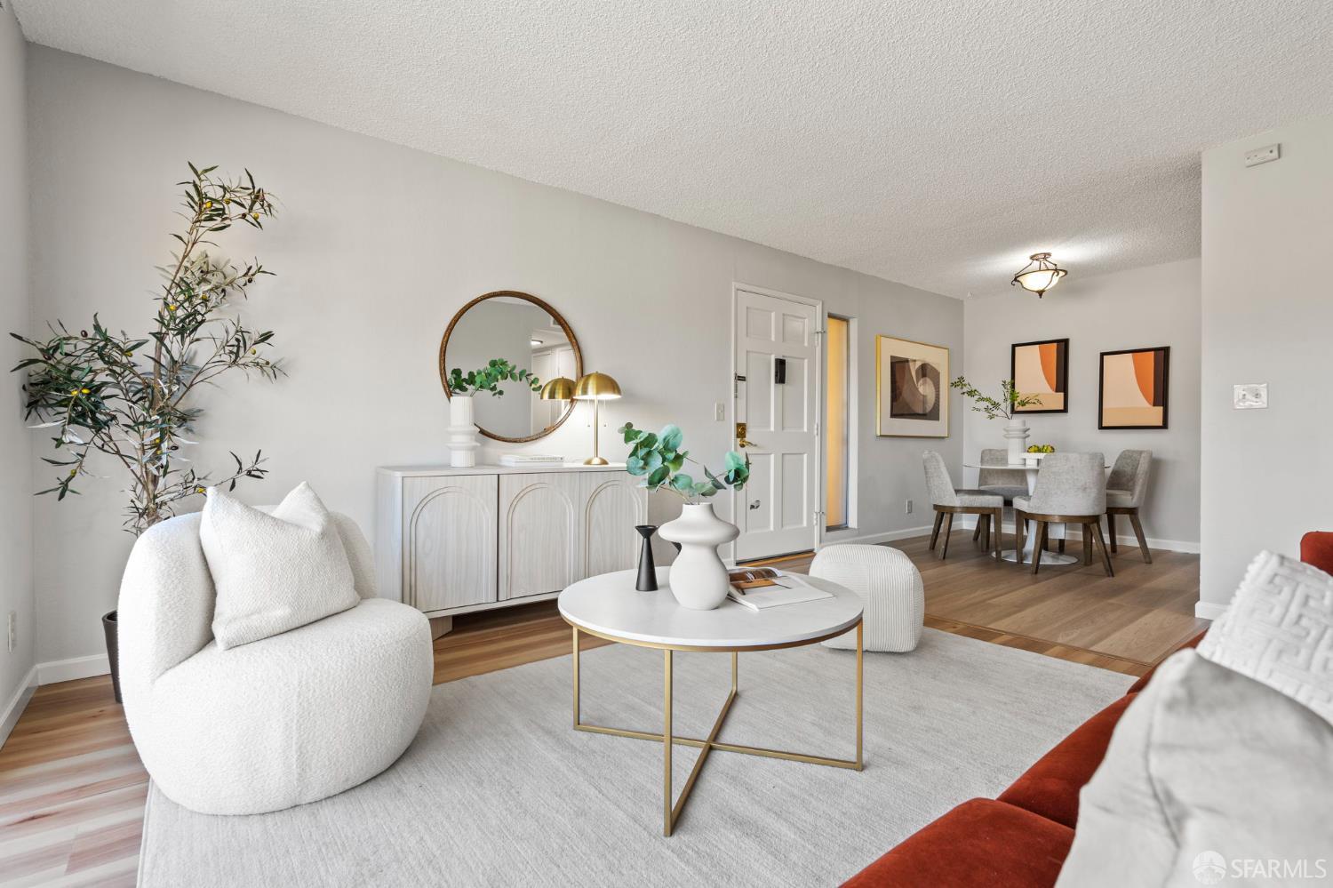 5319 Ridgeview Circle, Unit 10 El Sobrante, CA 94803 - Photo 6 of 26 a living room with furniture a rug and a potted plant