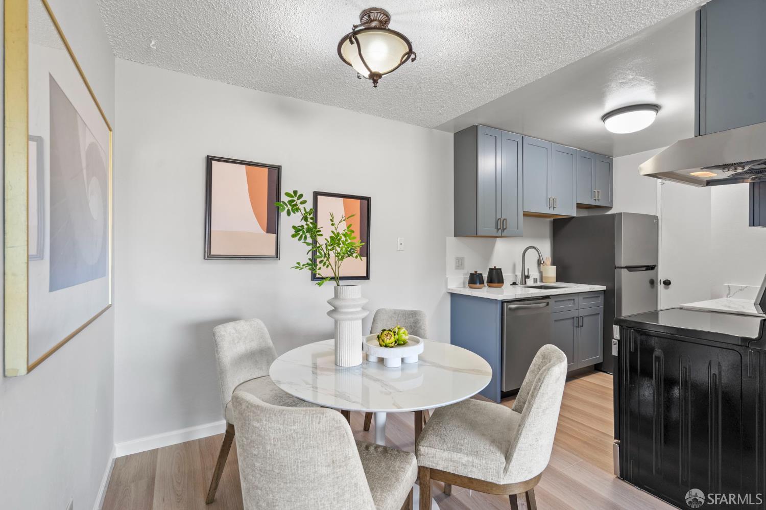 5319 Ridgeview Circle, Unit 10 El Sobrante, CA 94803 - Photo 7 of 26 a view of a dining room with furniture a rug and wooden floor