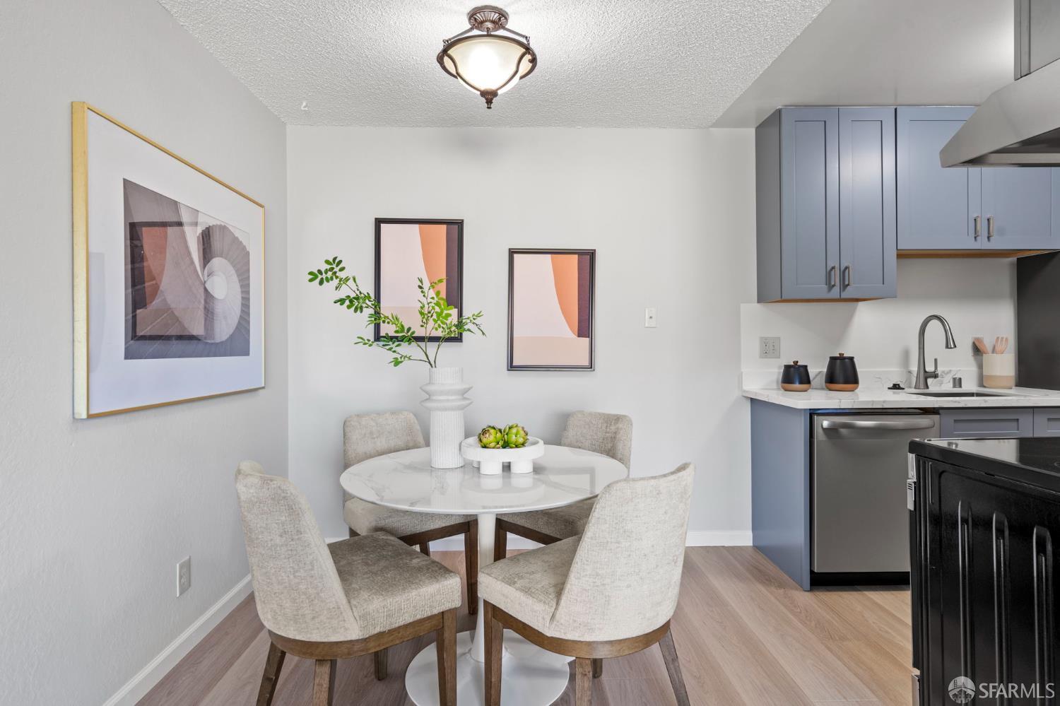 5319 Ridgeview Circle, Unit 10 El Sobrante, CA 94803 - Photo 8 of 26 a view of a dining room with furniture wooden floor and a chandelier
