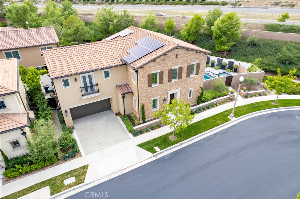 58 Riverboat Irvine, CA 92602 - Photo 67 of 72 an aerial view of a house with a yard