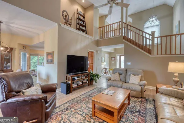 a spacious bathroom with a double vanity sink mirror and shower