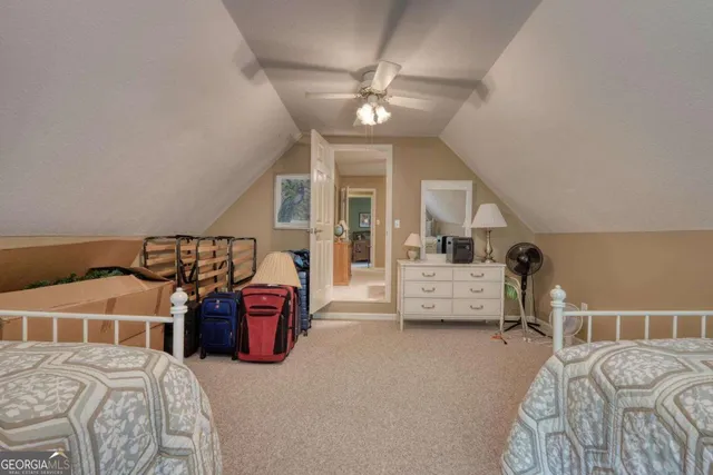 a view of a chair and table in the balcony