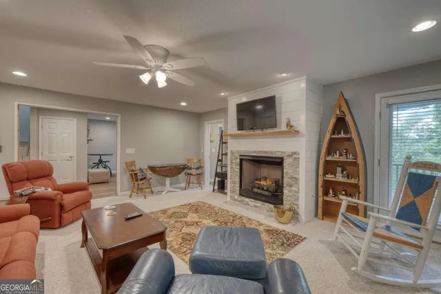 a view of a house with a yard and garage