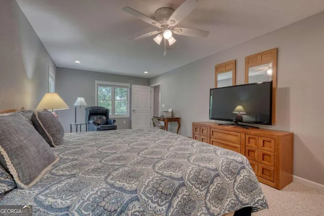 a view of balcony with wooden floor and outdoor seating
