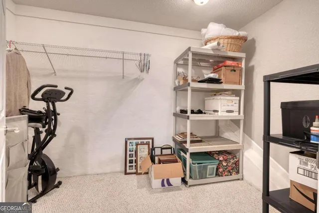 a view of a balcony with wooden floor